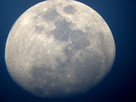 Full moon in the dark blue sky. Close up shot.の写真素材