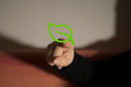 Ecology concept with hand pressing green eco icon on the virtual screenの写真素材