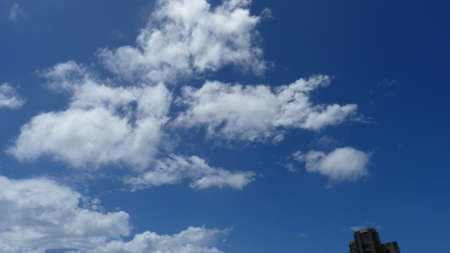 Fluffy cloudsの写真素材