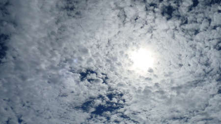 The sun is behind the cloudsの写真素材