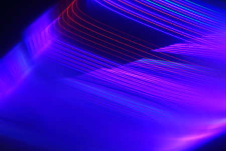 Application of comprehensive background light effects. Curved lines in blue and pink.