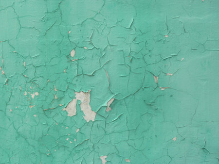 Peeling green paint on a wall. Abstract background for design.の写真素材