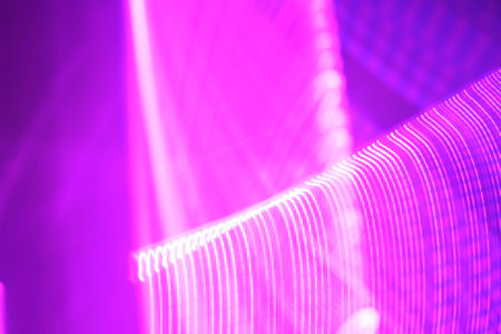 abstract background with glowing particles and bokeh defocused lights