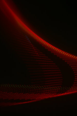 abstract red technology background with motion blur and light ray effect.の写真素材