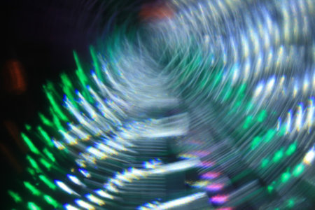 Vibrant abstract background with bokeh defocused lights.