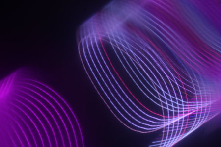 abstract background with magic light effect. purple and pink lines.の写真素材
