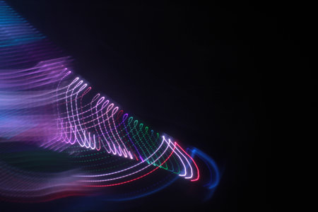 abstract background with magic light curved lines and bokeh effect