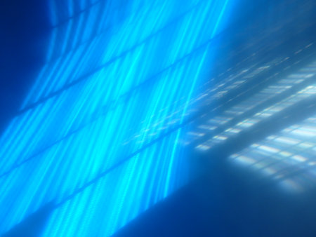 Application of comprehensive background light effects. Curved lines in blue.の写真素材