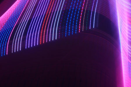 abstract background of the colored lines and blurred lights in the darkの写真素材