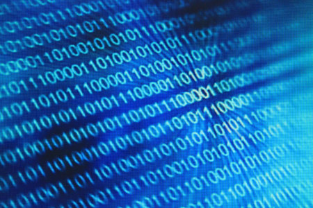 Binary code on a blue background. Close-up of binary code.の写真素材