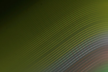 abstract background with smooth lines in green and yellow colors for designの写真素材