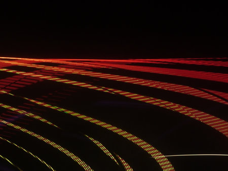 abstract light trails on the black background, closeup of photo