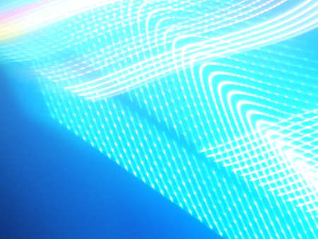 Abstract light lines background. Glowing streaks on a dark blue background.