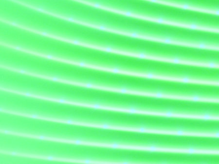 Green abstract background with stripes and light spots.