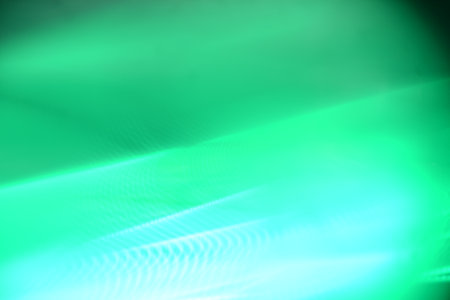 Application of comprehensive background light effects, digitally generated image in green tones.