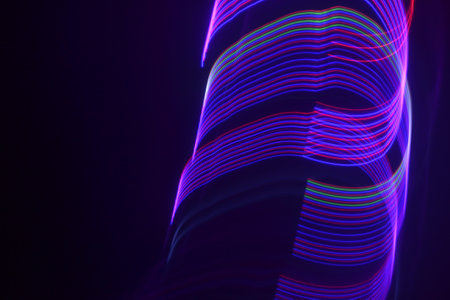 Neon abstract background. Light painting effect. Glowing lines.の写真素材