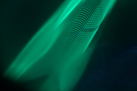 abstract background with smooth lines in dark blue and green colors.