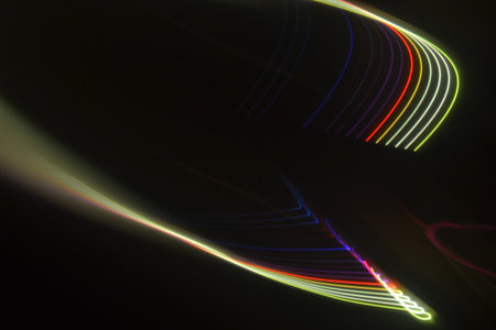 abstract background with some smooth lines in it and some light effects