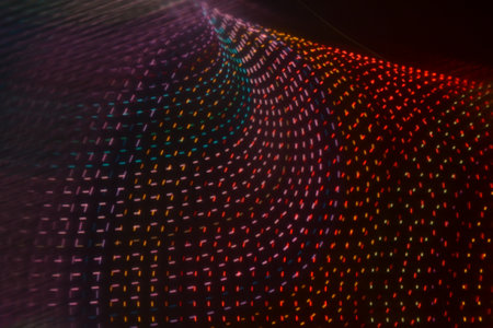 abstract colorful background with motion blur defocused bokeh lightsの写真素材