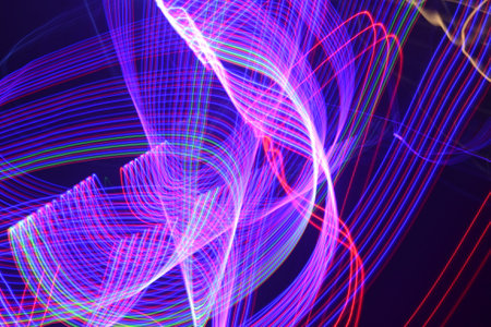 abstract background with colorful lines on a dark background, long exposure