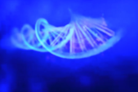 DNA helix in blue light. Abstract background and texture for design.の写真素材