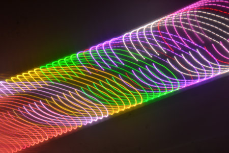 Abstract background with colorful lines and bokeh effect. Long exposure.の写真素材