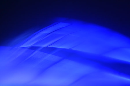 Application of comprehensive background light effects. Curved lines with blue tint.の写真素材