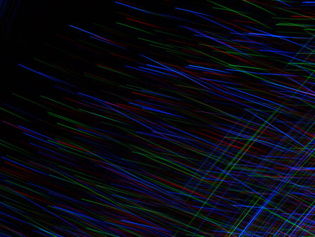 abstract background with multicolored lines on a black background.