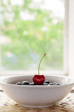 Healthy breakfast with bluberries and cherryの写真素材