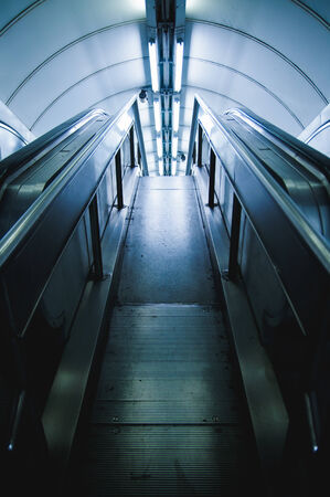 Staircase and escalator going down. London underground.のeditorial素材