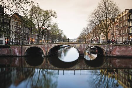 Amsterdam canal at sunriseの写真素材