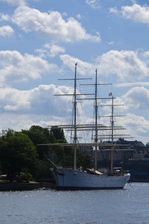 View of historical sailing vessel  Af Chapman  moored at the dock of Skeppsholmen island in Stockholm, Swedenの写真素材