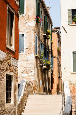 Narrow cobblestone alley in the historic center of Venice, Veneto, Italy, Europeのeditorial素材