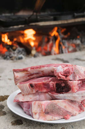 Raw steaks fiorentina-style, typical of Tuscany, Italy, ready to be cooked in a wood burning ovenの写真素材