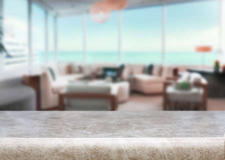 Wooden desk on interior backgroundの写真素材