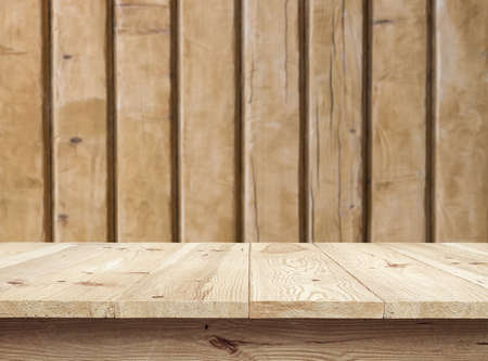 Wooden desk on a wooden background