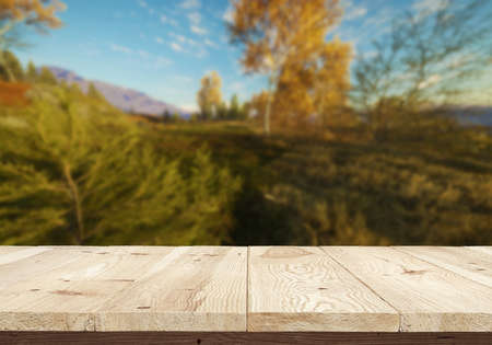Wooden desk on natural backgroundの写真素材
