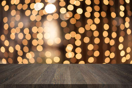 Wooden tablet on abstract background