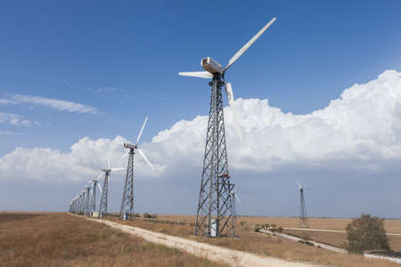 wind turbine on blue skyの写真素材