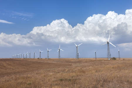 wind turbine on blue skyの写真素材