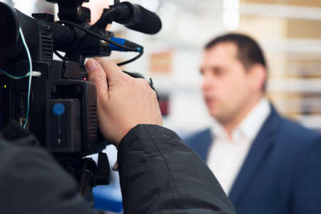 Hand and videocameraの写真素材