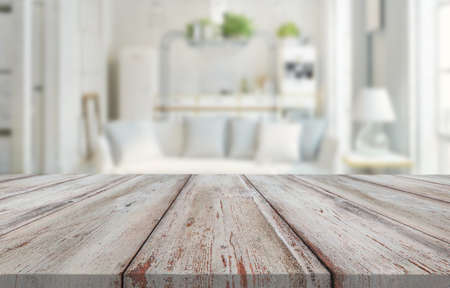 Wooden desk on interior backgroundの写真素材