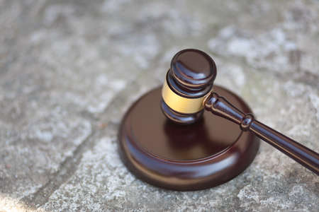 Wooden modern justice gavel on wooden desk, justice conceptの写真素材