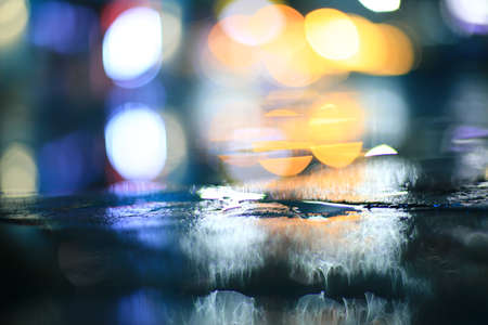 Dark abstract street light shiny bokeh blur backgroundの写真素材