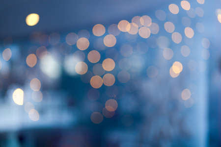 Dark abstract street light bokeh or blur backgroundの写真素材
