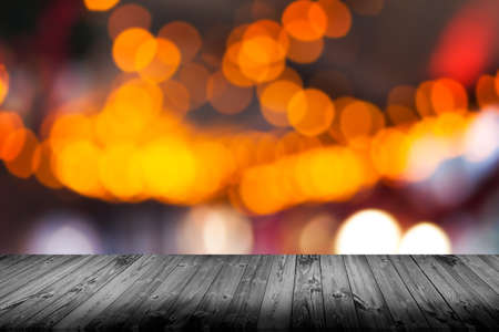 Wooden desk on blur or abstract natural backgroundの写真素材