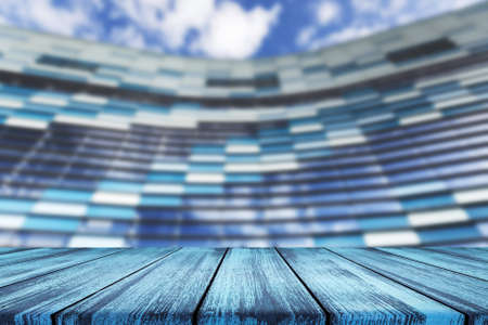 Wooden desk on blur or abstract natural backgroundの写真素材