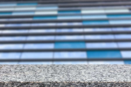 Wooden desk on blur or abstract natural backgroundの写真素材