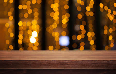 Wooden desk on blur or abstract backgroundの写真素材