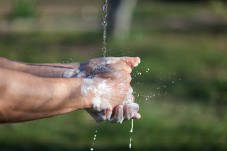 Disinfection prevention of viral diseases. Man's hands are washedの写真素材